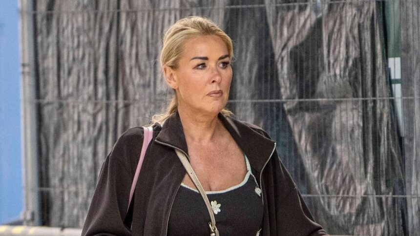 grieving claire sweeney cuts a sombre figure as shes seen for the first time following tragic death of ex partner and close friend ricky hatton aged 46 68c80aa5649ee