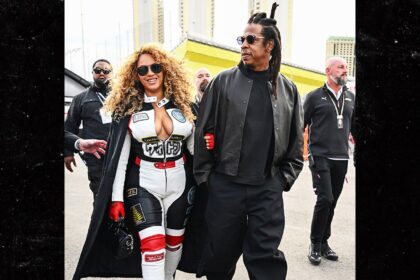 beyonce flashes cleavage in racer outfit at f1 las vegas grand prix 692259a68013d