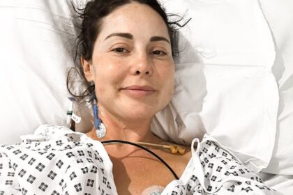 louise thompson shares two photos a year apart as she celebrates having no emergency surgeries for 12 months and admits to feeling cracked wide open after near fatal labour 6907f9248361e