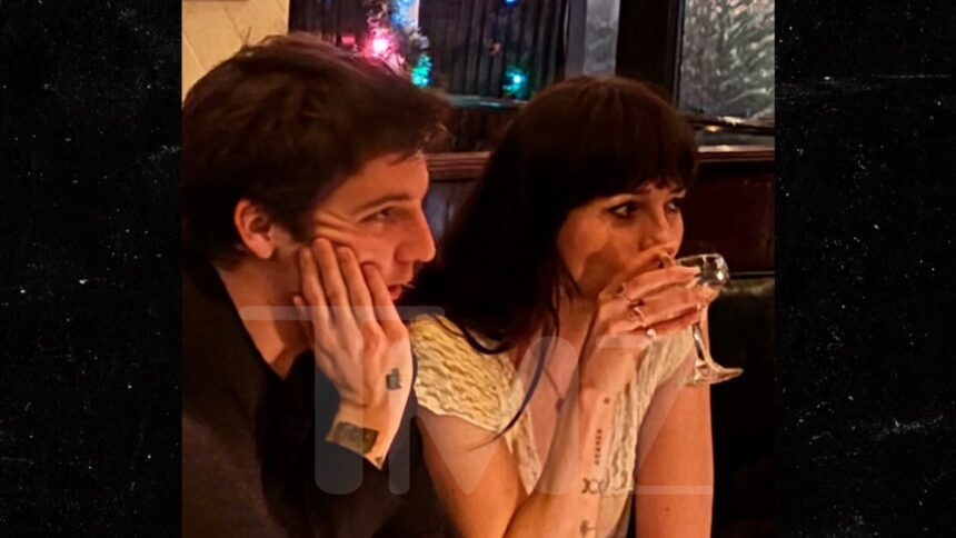 dakota johnson and role model seen getting cozy together at dinner in l a 69530d3e284ec