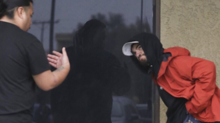 fans help tylor chase weather the cold and the rain on christmas eve on video 694c91dd2b0d4