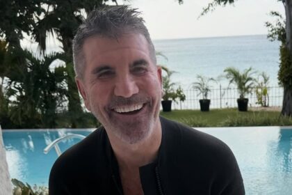 simon cowells fiancee lauren shares snaps of moguls playful side as she gives a rare insight into life with sons eric adam and their five dogs after she took on his surname 6945747b56bc9